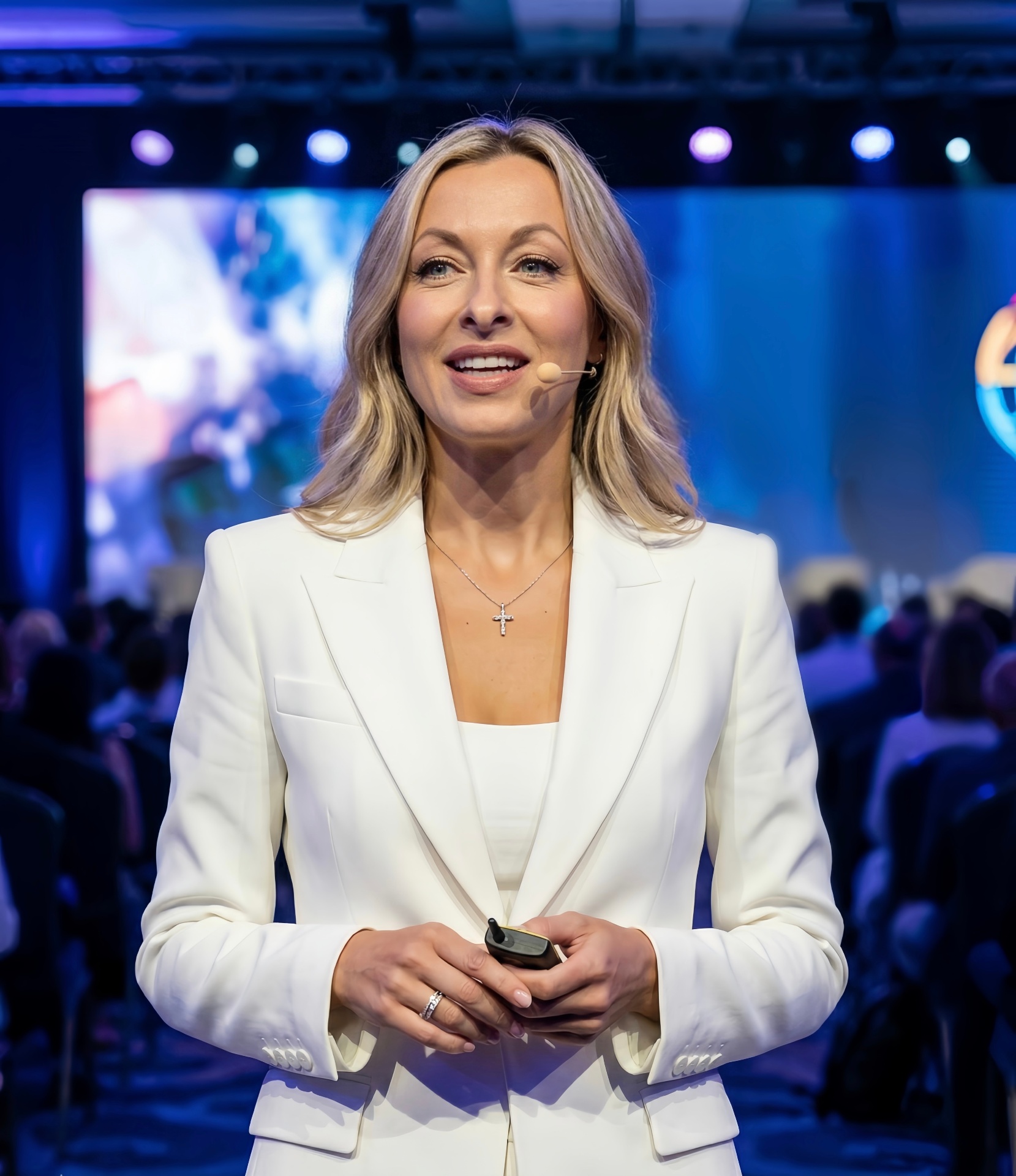 Monika Philp speaking on stage